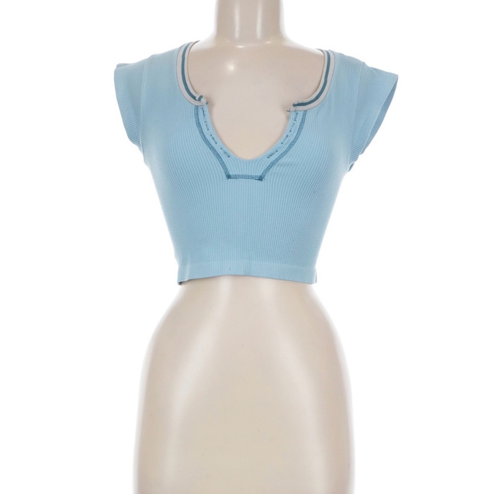 Urban Outfitters out from under blue crop top